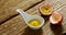 Passion fruit and spoon with passion fruit pulp on wooden table 4K 4k