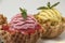 Passion Fruit and and strawberry ice cream in basket white background and fresh fruit cone shell