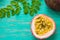 Passion fruits on wooden background,close up of fresh purple passion fruits harvest from farm,Half cut passion fruit.