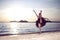 Passionate And Sensual Japanese Ballet Dancer in Black Tutu And Silver Crown Posing Near Seashore During Ballet Pas in Summertime