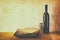 Passover background. wine and matzoh (jewish passover bread) over wooden background