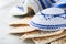 Passover celebration concept. Matzah, red kosher and walnut. Traditional ritual Jewish bread matzah, kippah and tallit