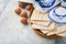 Passover celebration concept. Matzah, red kosher and walnut. Traditional ritual Jewish bread matzah, kippah and tallit