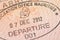 Passport page with Mauritius immigration control departure stamp with traditional Dodo bird depicted on it.