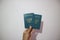 Passport of the Republic of Indonesia in hand