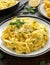 Pasta al Limone, Lemon with basil and parmesan cheese on wooden table