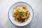 Pasta alla norma. Made with maccheroni, eggplant, tomatoes, fresh basil and grated ricotta salata.