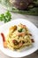 Pasta with artichoke cream and bacon