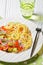 pasta with avocado  tomatoes and lime  top view