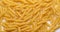 pasta backgroud - macro view of Dry Authentic Italian penne