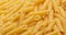 pasta backgroud - macro view of Dry Authentic Italian penne