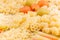 Pasta background assortment of different kinds italian macaroni closeup.