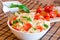 Pasta with basil, tomatoes and italian cheese mozzarella