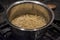 Pasta boiling in bowl