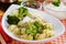 Pasta with broccoli and grated cheese