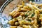 Pasta with chicken in a cream sauce, seasoned with fresh herbs