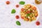 Pasta colored farfalle salad with tomatoes