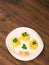 Pasta decorated shrimp with parsley on a wooden background