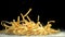 Pasta falls on a board with flour. View from above. Filmed on a high-speed camera at 1000 fps.