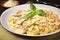 pasta fettuccine alfredo with chicken and parmesan. Italian cuisine