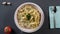 Pasta fettuccine alfredo with chicken, parmesan and parsley. Scene. Pasta fettuccine with mushrooms and fried chicken