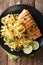 Pasta fetuccini with cheese cheddar and grilled salmon with herb