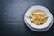 Pasta four cheeses. Italian food. On a wooden background