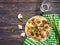 Pasta, fried mushrooms cooking on a wooden background