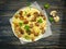 Pasta, fried mushrooms on a wooden background