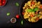 Pasta Fusilli with tomatoes, beef and basil