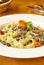 Pasta with meat, cherry tomatoes and cheese