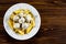 Pasta with meatballs and sauce on wooden table