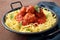 Pasta Meatballs in tomato sauce in metal pan