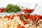 Pasta with mushrooms, cherry tomatoes and tomato sauce, italian food. Closeup