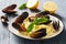 Pasta with mussels , lemons and parmesan closeup