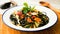Pasta nero di sepia. Pasta cooked with seafood such as mussels, clams and prawns.