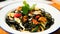 Pasta nero di sepia. Pasta cooked with seafood such as mussels, clams and prawns.