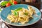 Pasta pappardelle with mixed wild mushrooms and creamy sauce