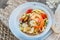 Pasta plate with shrimps, mussels, clams. Spaghetti recipe with seafood and tomatoes