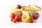 Pasta Products with Tomato Cheese Raw Pasta Fusili Fettuccine Ingredients Italian Food White Background Close Up