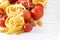 Pasta Products with Tomato Cheese Raw Pasta Fusili Fettuccine Ingredients Italian Food White Background Close Up Copy Space