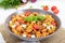 Pasta Radiatori with chicken, mushrooms, cherry tomatoes, feta cheese