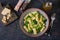 Pasta rigatoni with broccoli and green peas. Vegan menu. Dietary food. Flat lay.