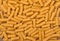 Pasta rigatoni texture, heap of Italian pasta