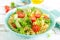 Pasta salad with avocado, fresh tomato, pepper and lettuce