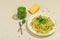 Pasta with salmon, wild leek pesto and parmesan. Fresh spaghetti and greens. Healthy vegan food