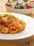 Pasta with scallop and tomato sauce