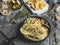 Pasta with seafood, shellfish clams in the iron pan portion, with lemon and seasoning