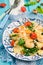 Pasta with shrimp, spinach and cherry tomatoes