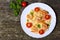 Pasta with shrimp, tomatoes, herbs and cream sauce.